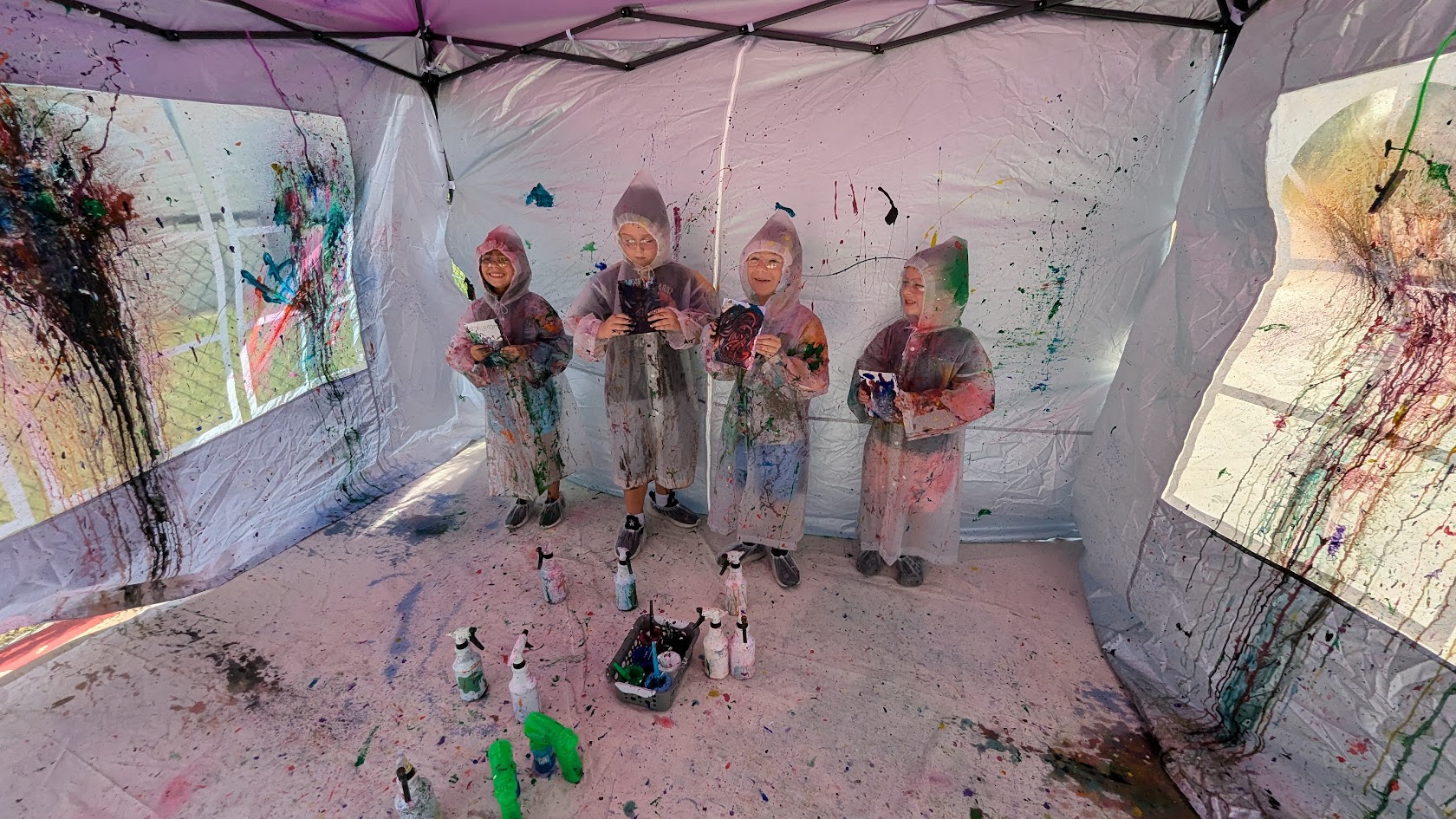 Bright splatter paint event setup